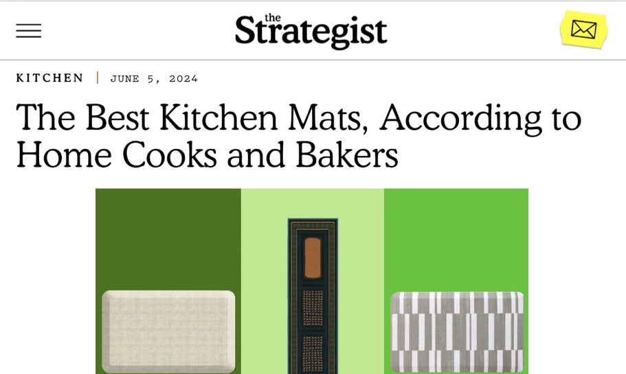 A screenshot of an article from The Strategist titled "The Best Kitchen Mats, According to Home Cooks and Bakers" featuring the House of Noa Nama Standing Mat in Basil