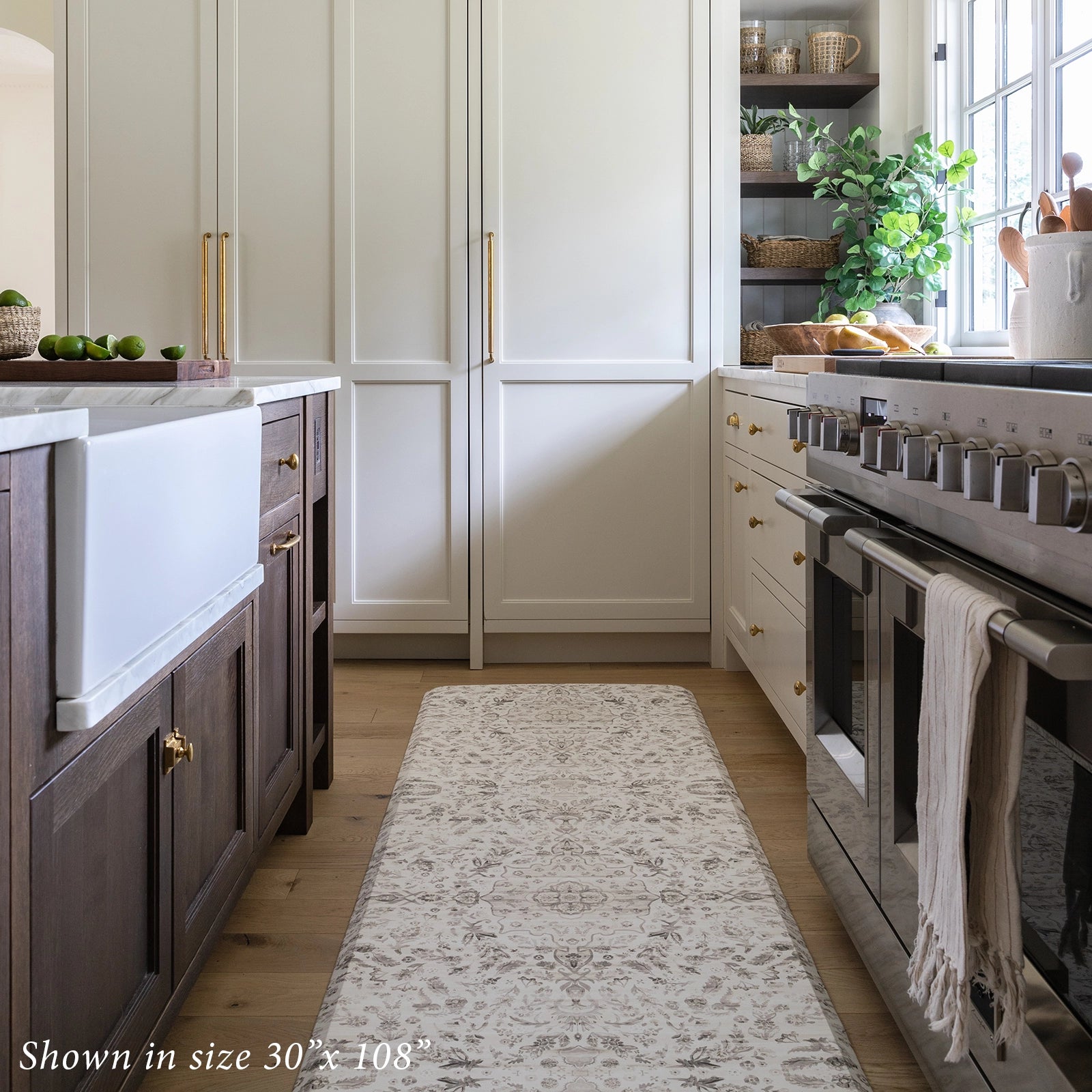 Emile latte beige and gray floral boho kitchen mat shown in kitchen size 30x108