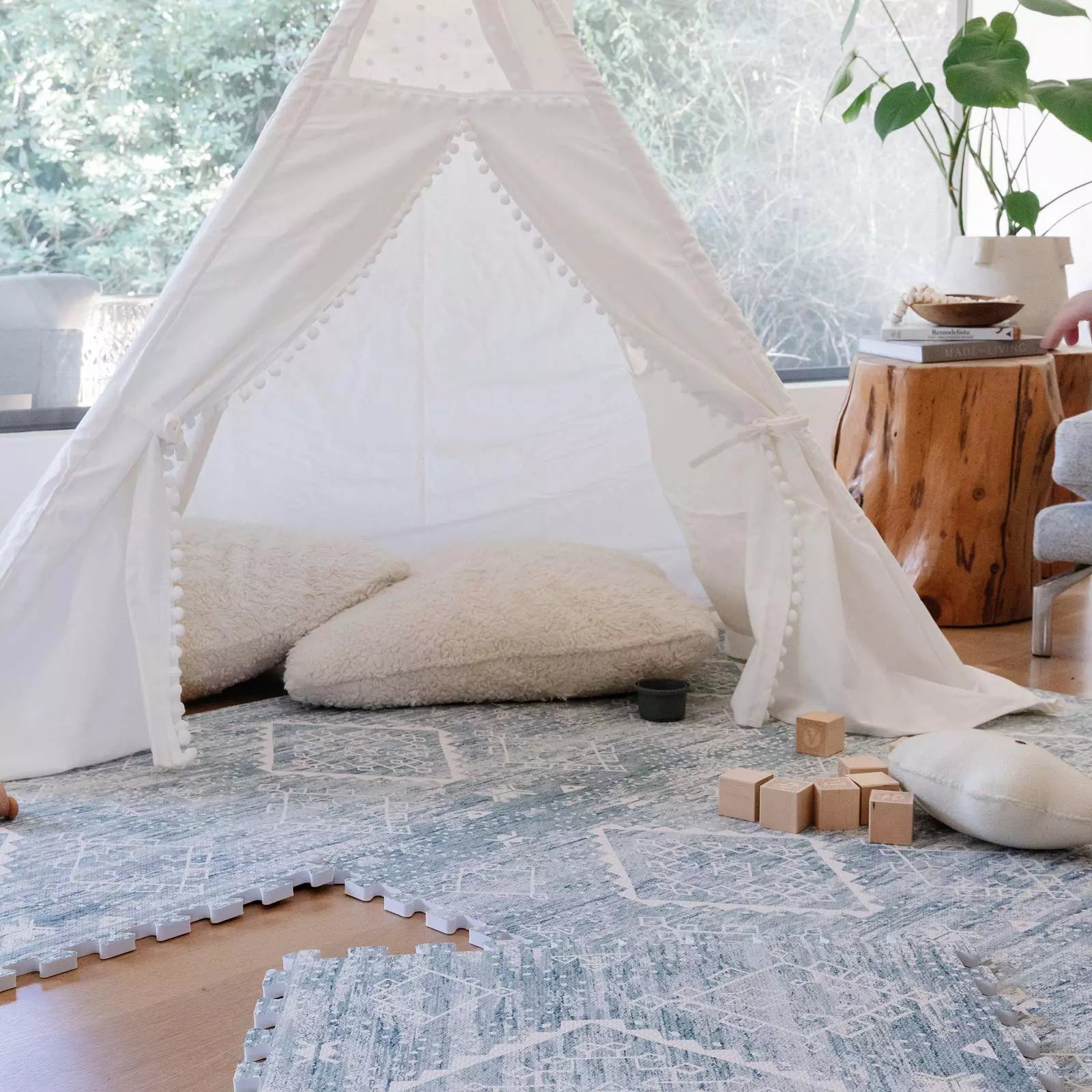 Indigo Blue Minimal Boho Pattern play mat in living room with teepee