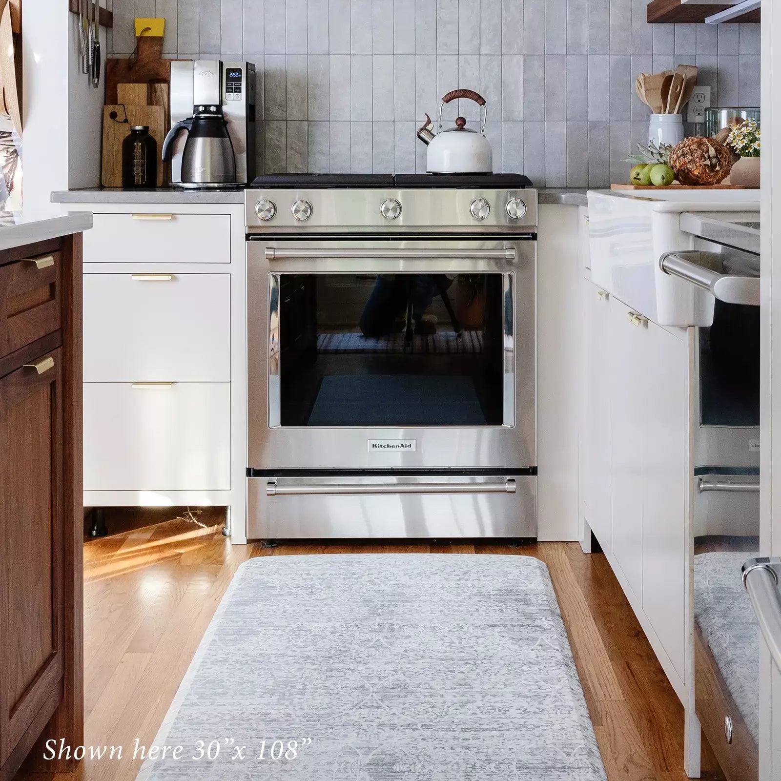 Gray neutral boho print kitchen mat in kitchen shown in size 30x108